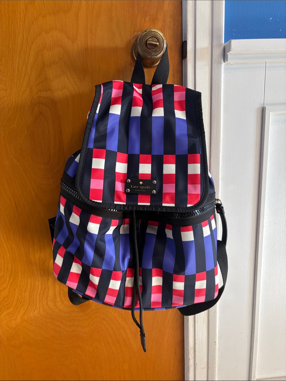 kate spade navy, red and white striped checker backpack